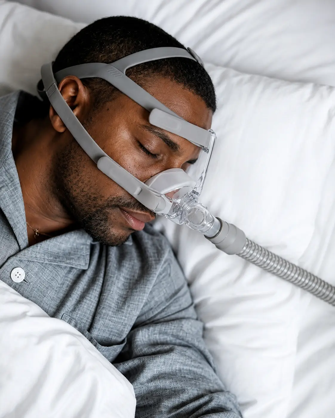 Veteran sleeping while wearing a CPAP mask
